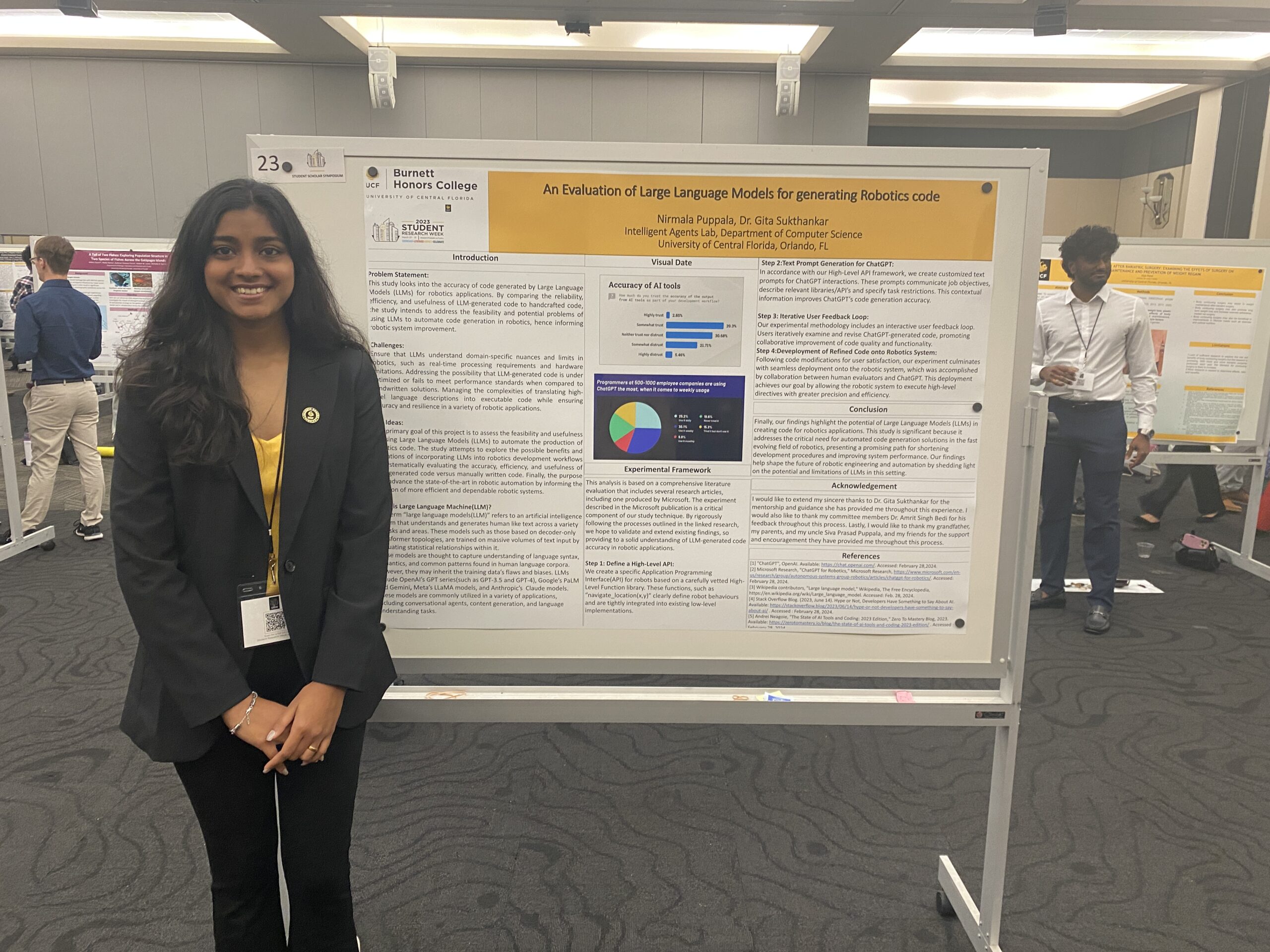student with poster at Student Research Week