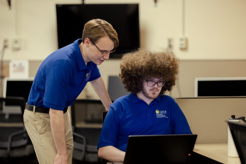 students in front of a computer
