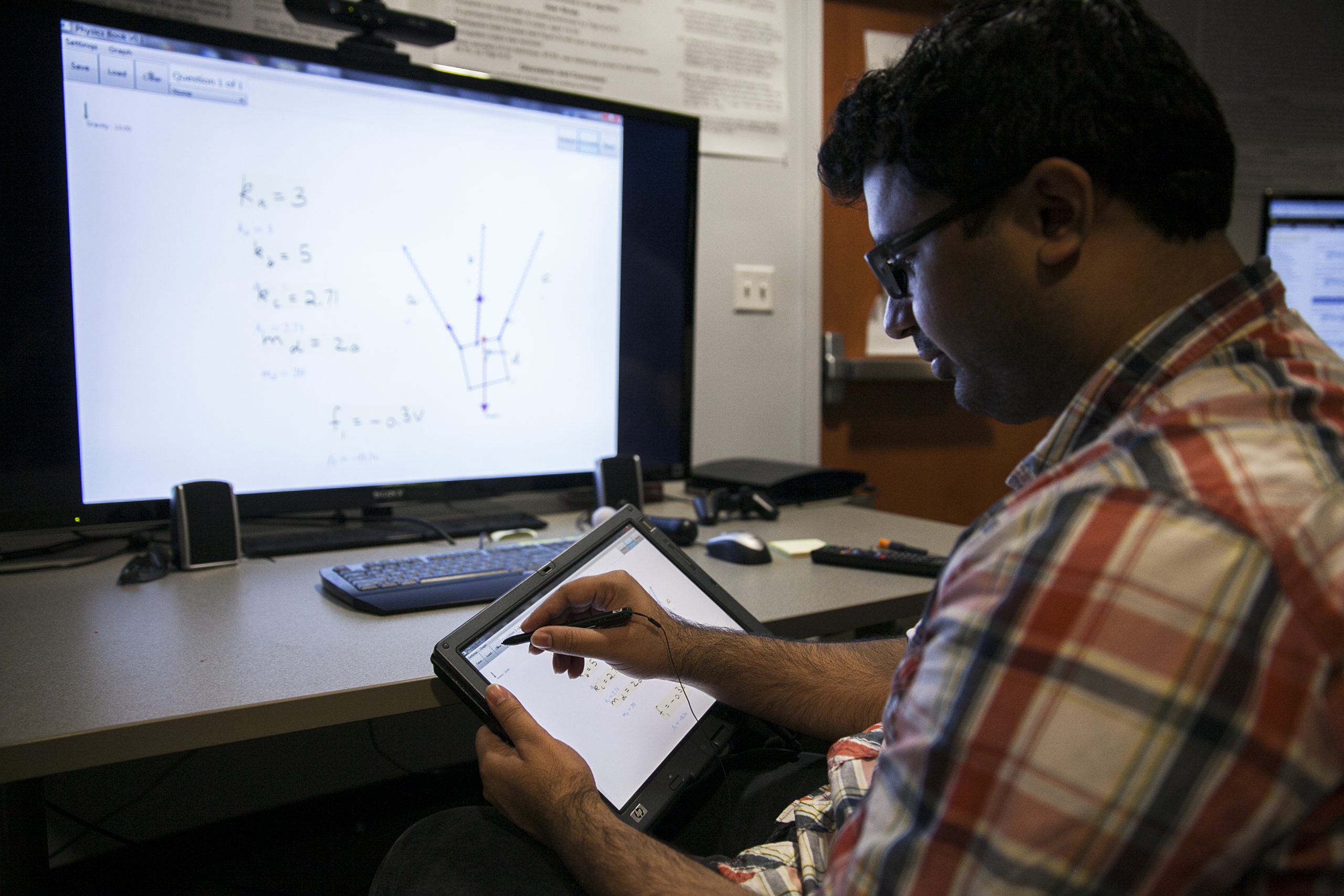 student in front of computer